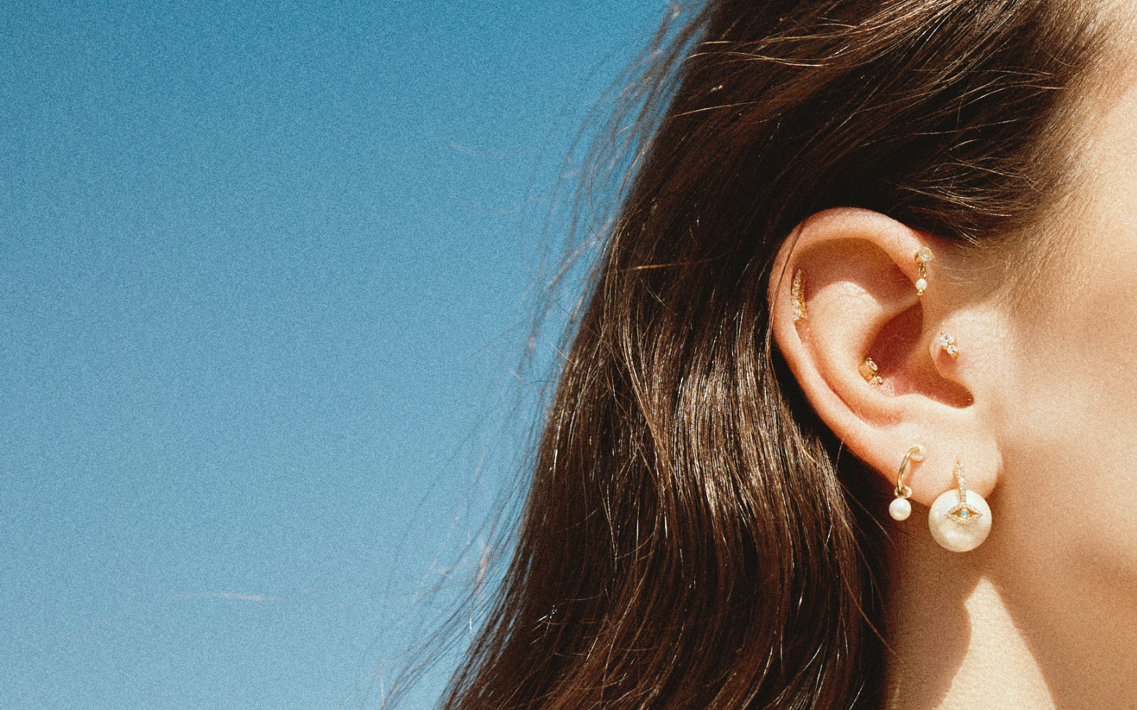 Gold tragus and cartilage piercing studs for the infected tragus piercing care guide