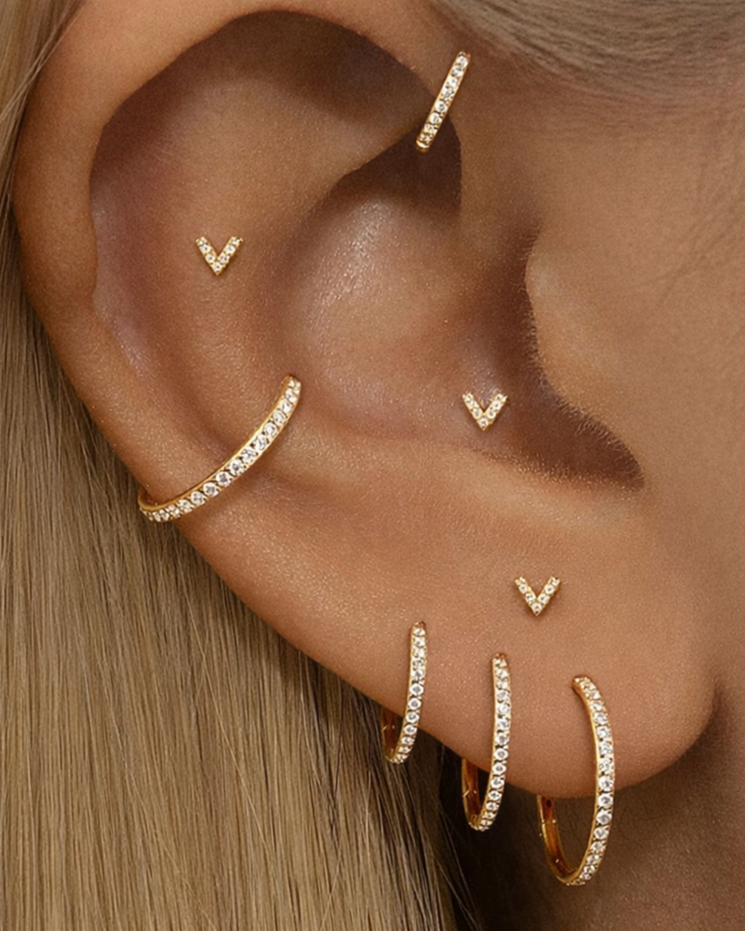 The Ultimate Guide to Ear Piercings, Earrings & Ear Stacks