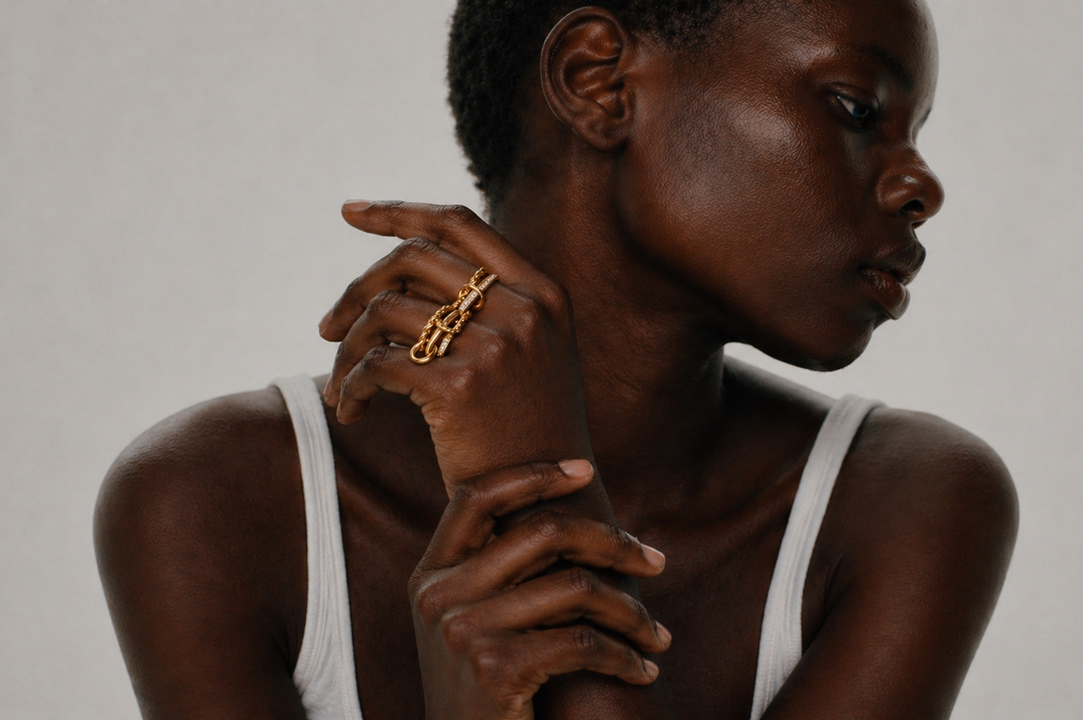 Gold rings layered together for a guide to hypoallergenic jewellery materials