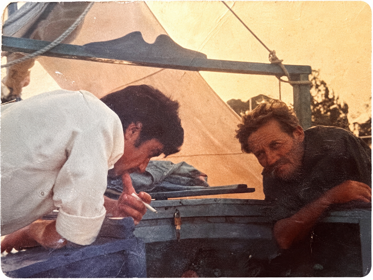 Vintage family photograph of Dimitra’s grandfather Thomas and a friend building his handmade fishing boat Lefki in Preveza, Greece.