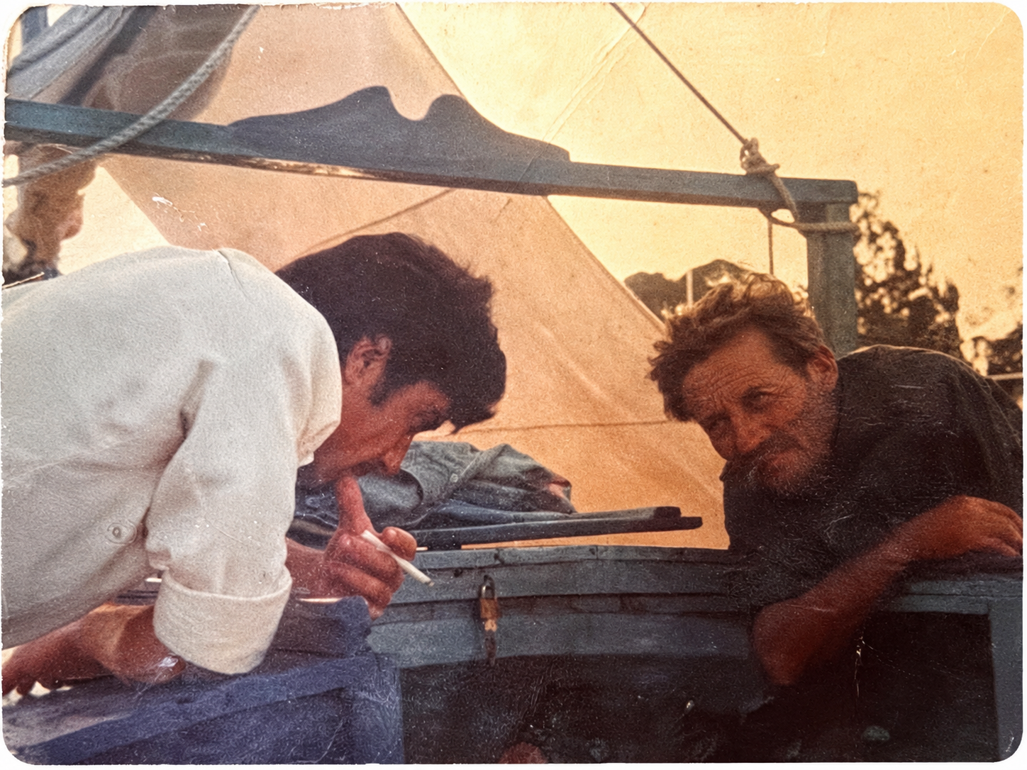 Vintage family photograph of Dimitra’s grandfather Thomas and a friend building his handmade fishing boat Lefki in Preveza, Greece.