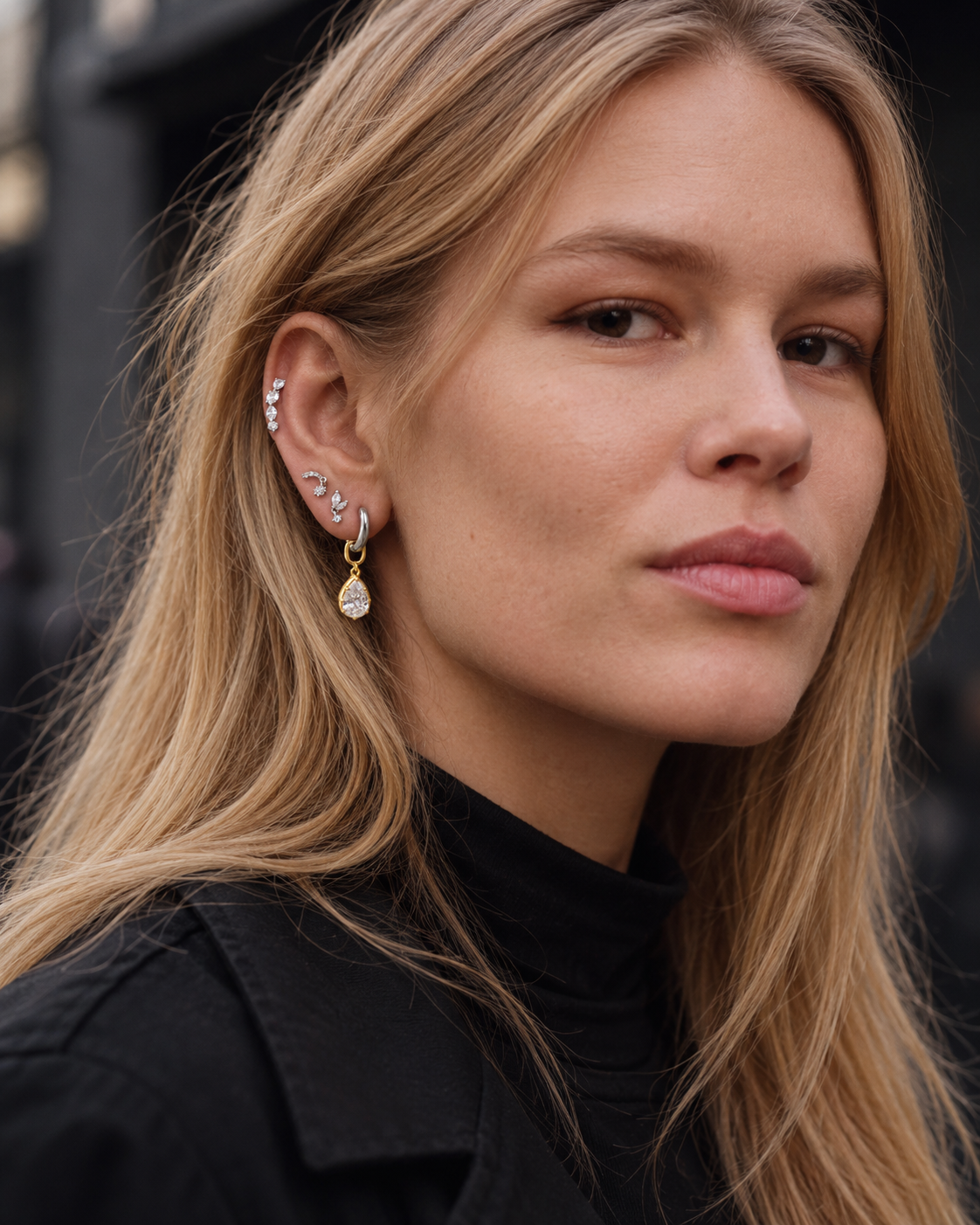 Balanced ear stack by Galleria Armadoro featuring the Riviera Pin on the helix and the Vittoria modular teardrop charm at the lobe.