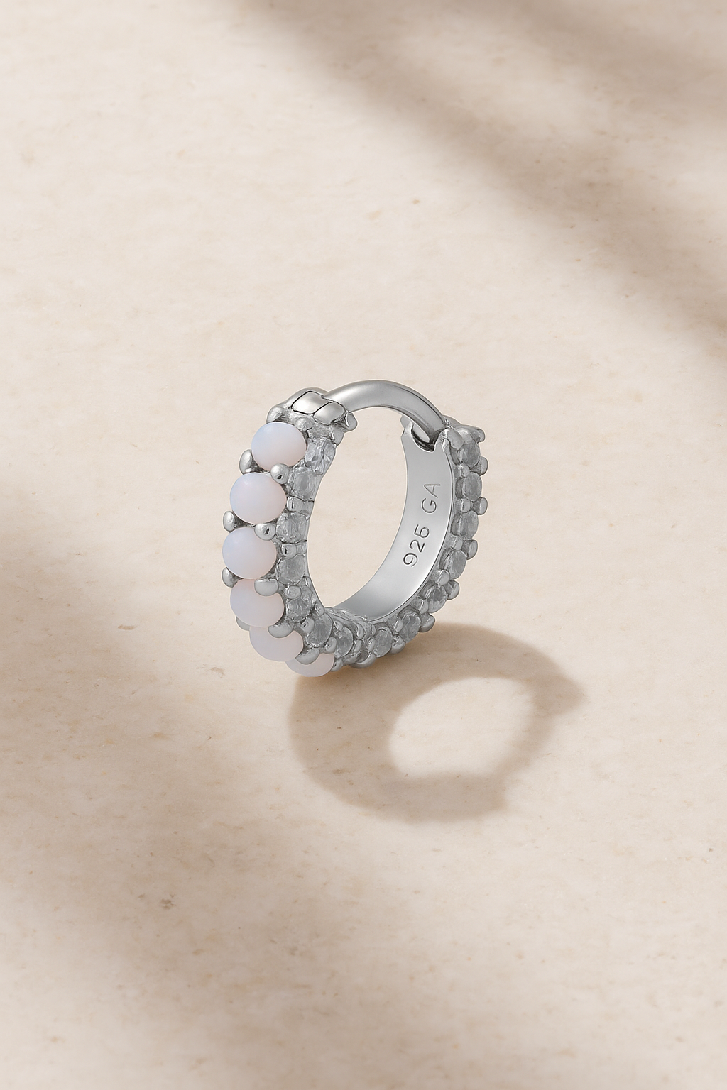 Barrel white cz & opal sterling silver huggie