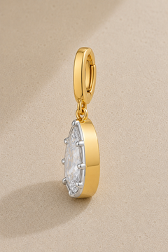 Gold and silver teardrop crystal hook charm hanging from signature clasp