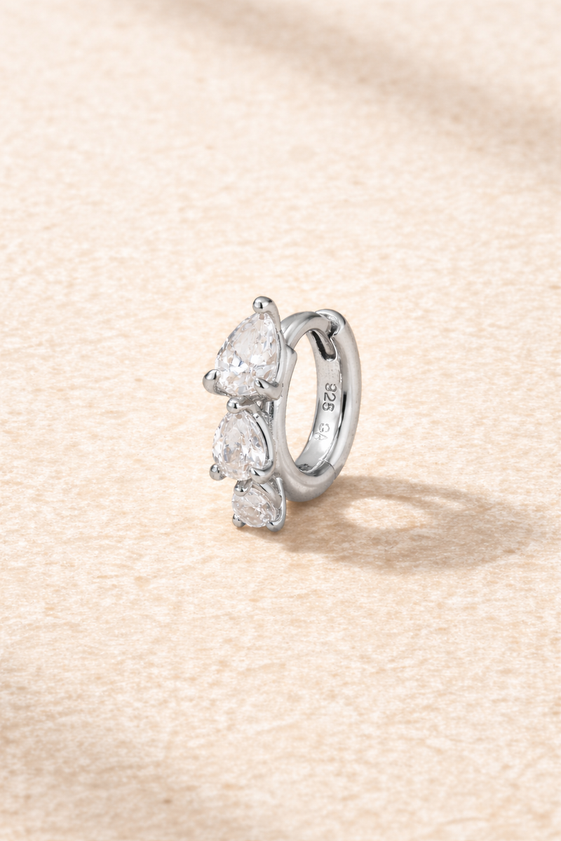 “Cascade Huggie silver 6.5 mm with graduated pear-cut white cubic zirconia”