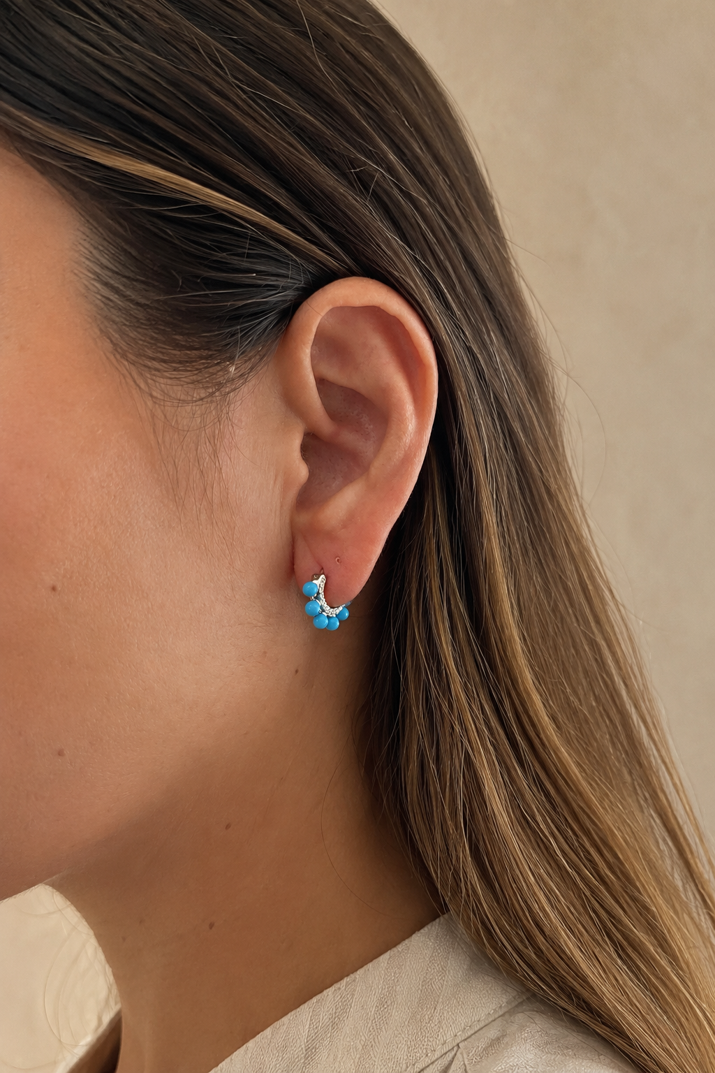 Coronet turquoise sterling silver huggie