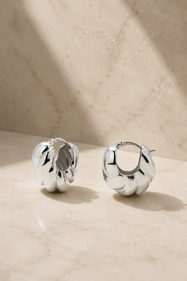Gemma sterling silver hoop earrings, sculptural 2 cm hoops with a polished white rhodium finish