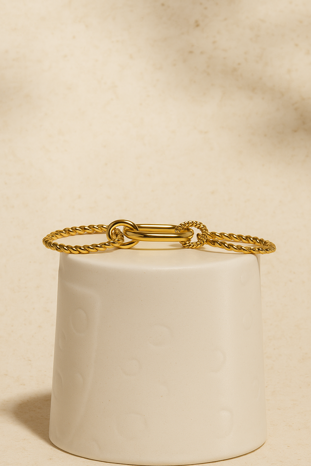 Mixed gold ring stack showing Carmella Speira beside pavé and twisted bands.