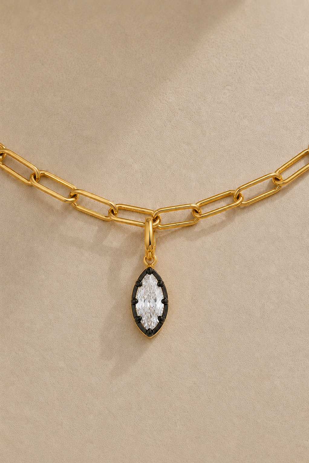 Gold paperclip bracelet with Vittoria black and gold marquise crystal charm