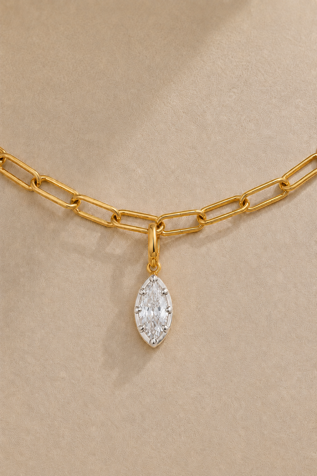 Gold paperclip bracelet with Vittoria silver and gold marquise crystal charm