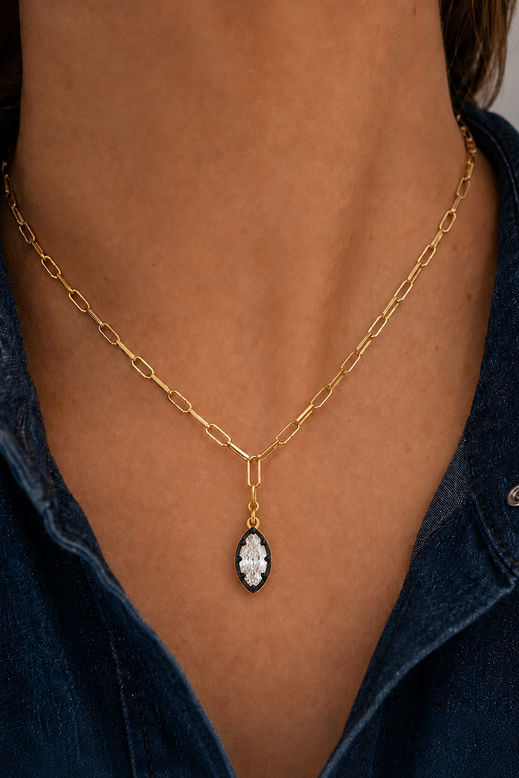 Vittoria gold and black marquise charm worn on gold paperclip chain necklace