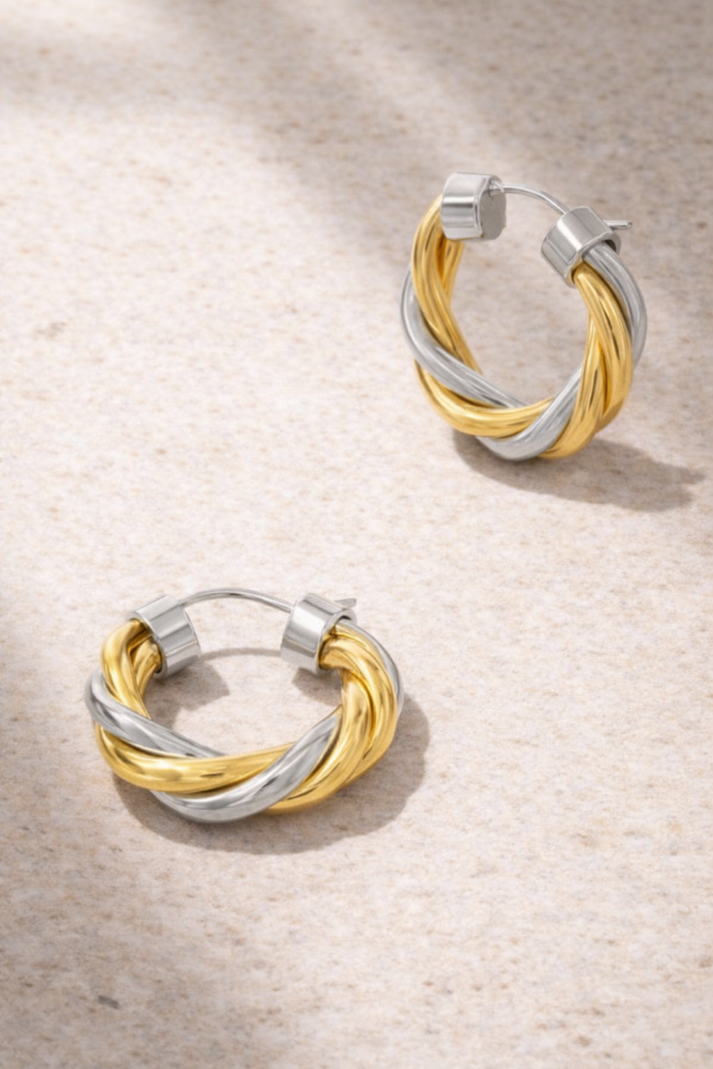 close up twisted gold and silver hoop earrings 3cm chunky lightweight hoopsclose up twisted gold and silver hoop earrings 3cm chunky lightweight hoops