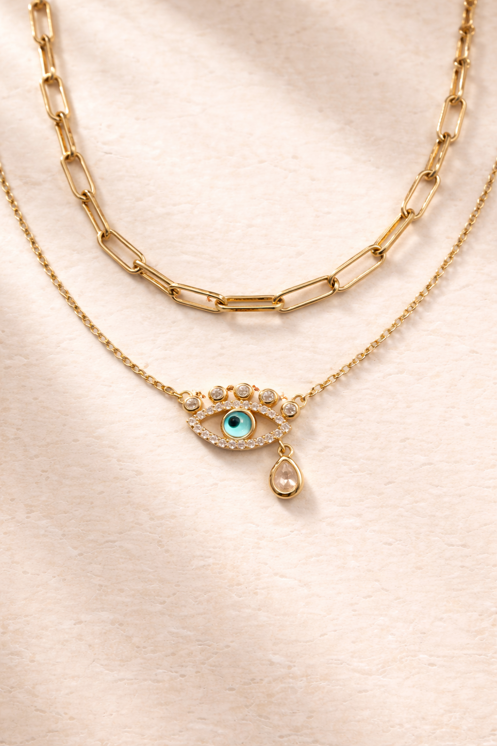 Layered gold necklaces