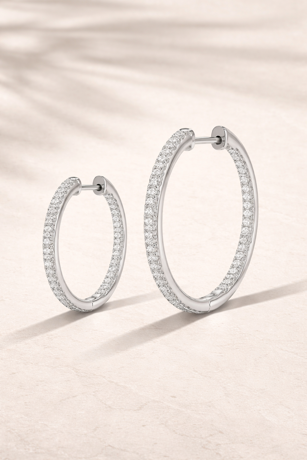 Double ear piercing sterling silver inside out pavé hoop set with 18mm and 22mm white CZ stones
