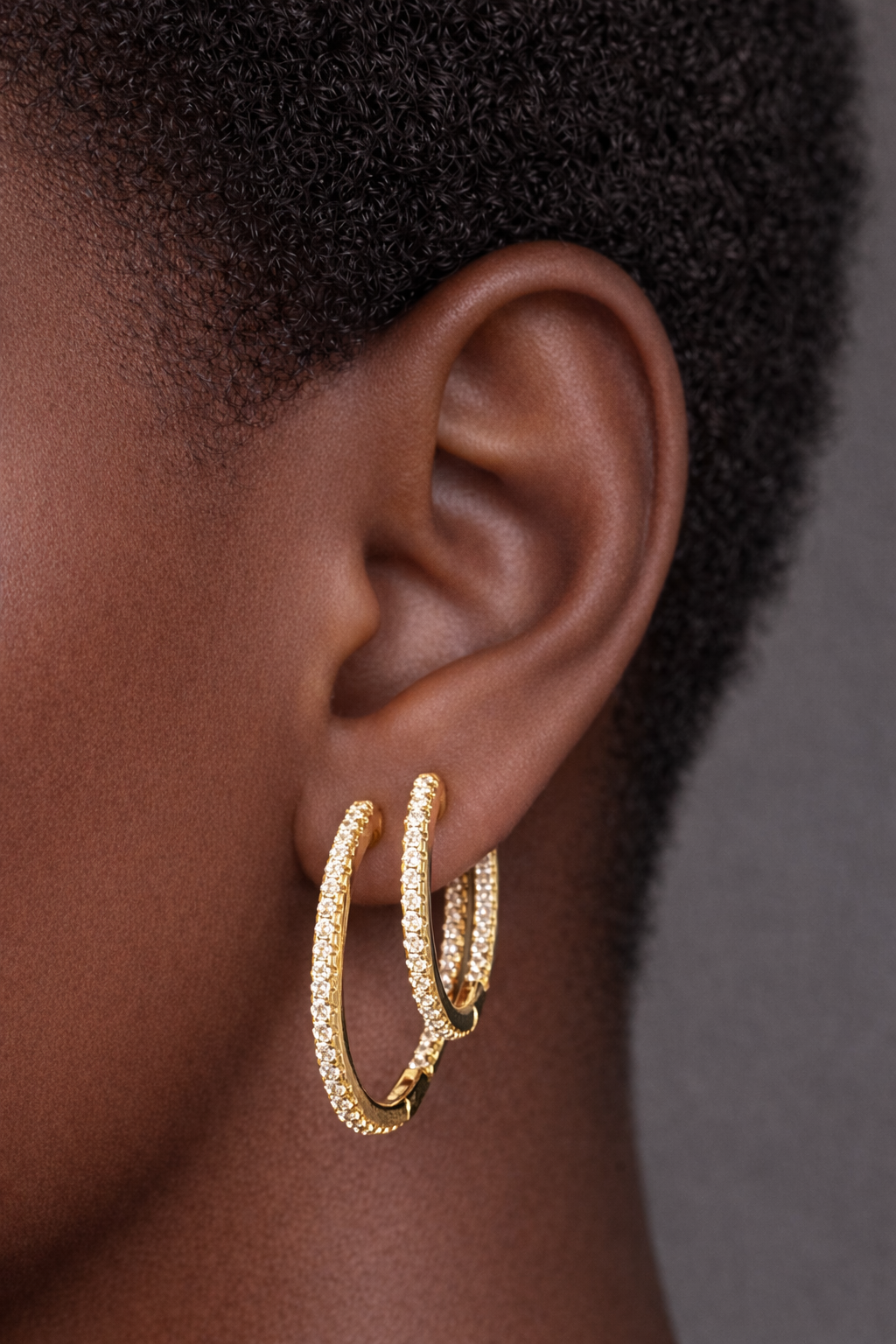 Two earrings in one ear styling with 18mm and 22mm inside out gold vermeil pavé hoops