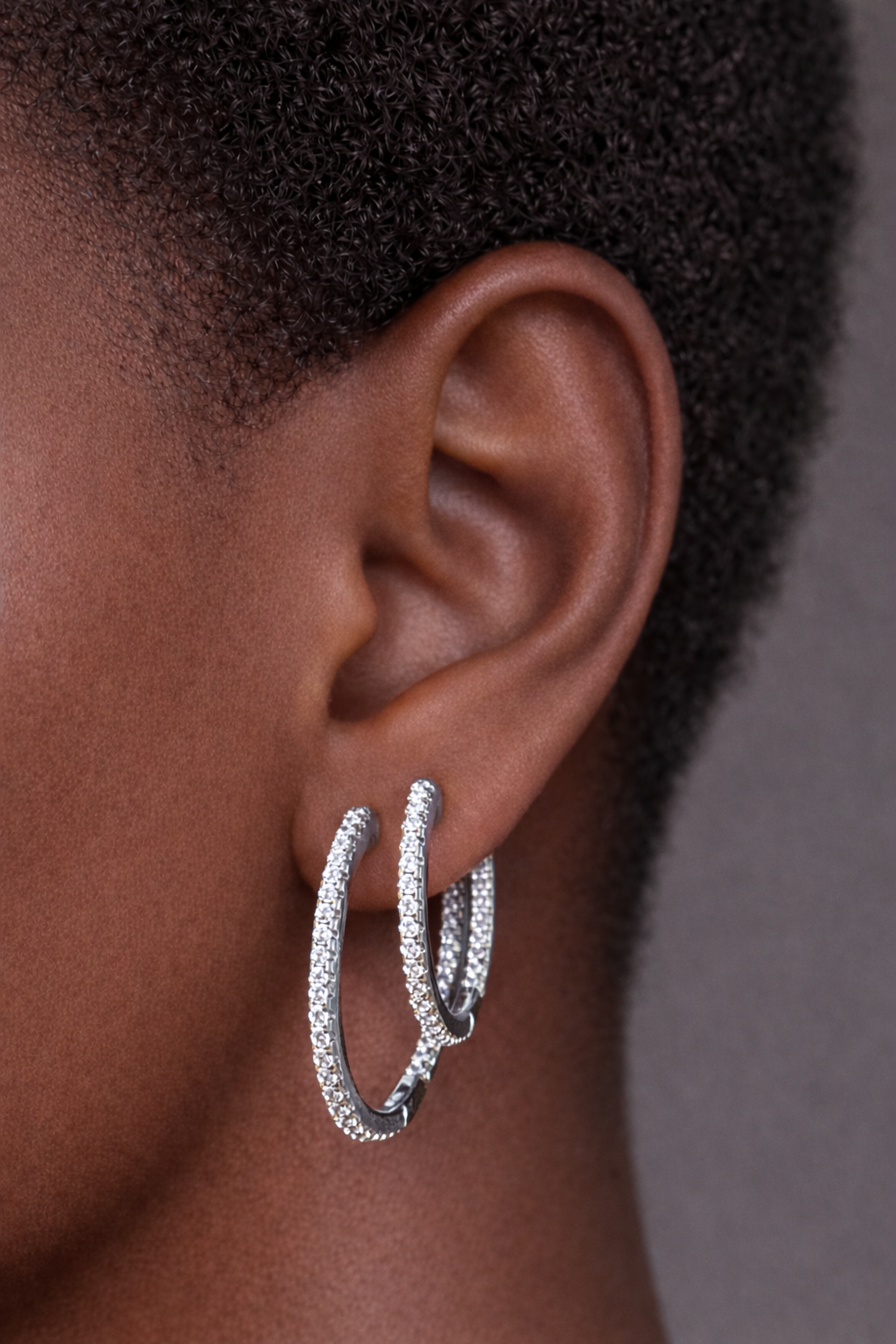 Two earrings in one ear styling with 18mm and 22mm inside out sterling silver pavé hoops