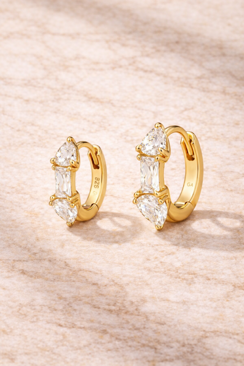 Double ear piercing gold mini hoop set with 6.5mm and 8.5mm Ivy huggies and white cubic zirconia