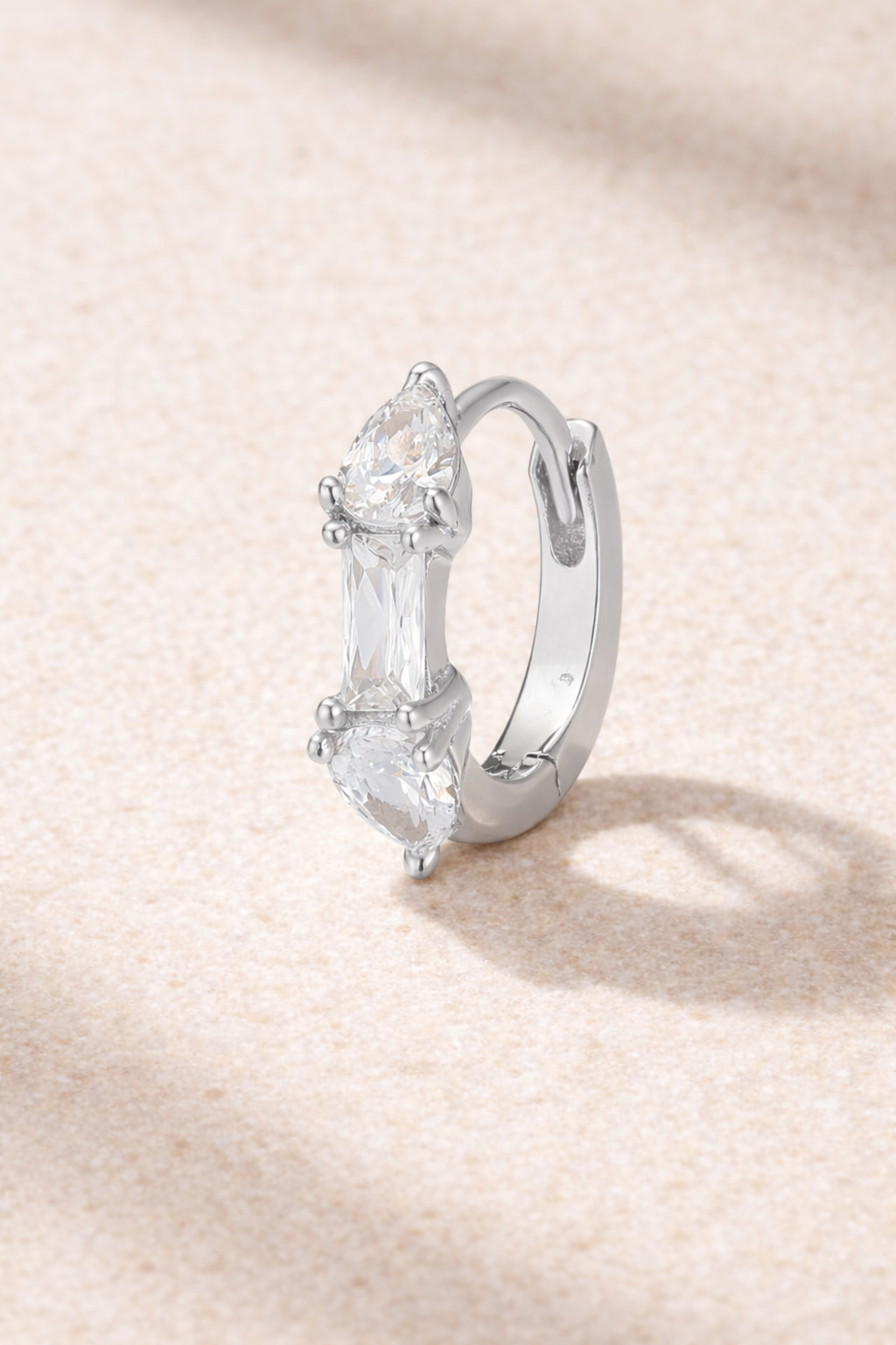 Ivy Mini Hoop silver huggie with white cubic zirconia stones