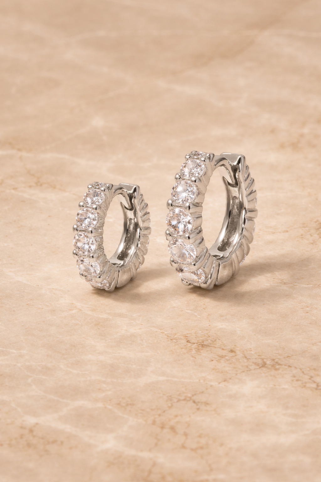 Double ear piercing sterling silver huggie set with 6.5mm and 8.5mm jumbo graduated white CZ stones
