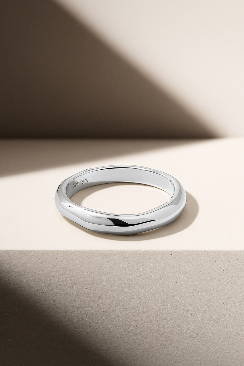 Kyma band sterling silver ring