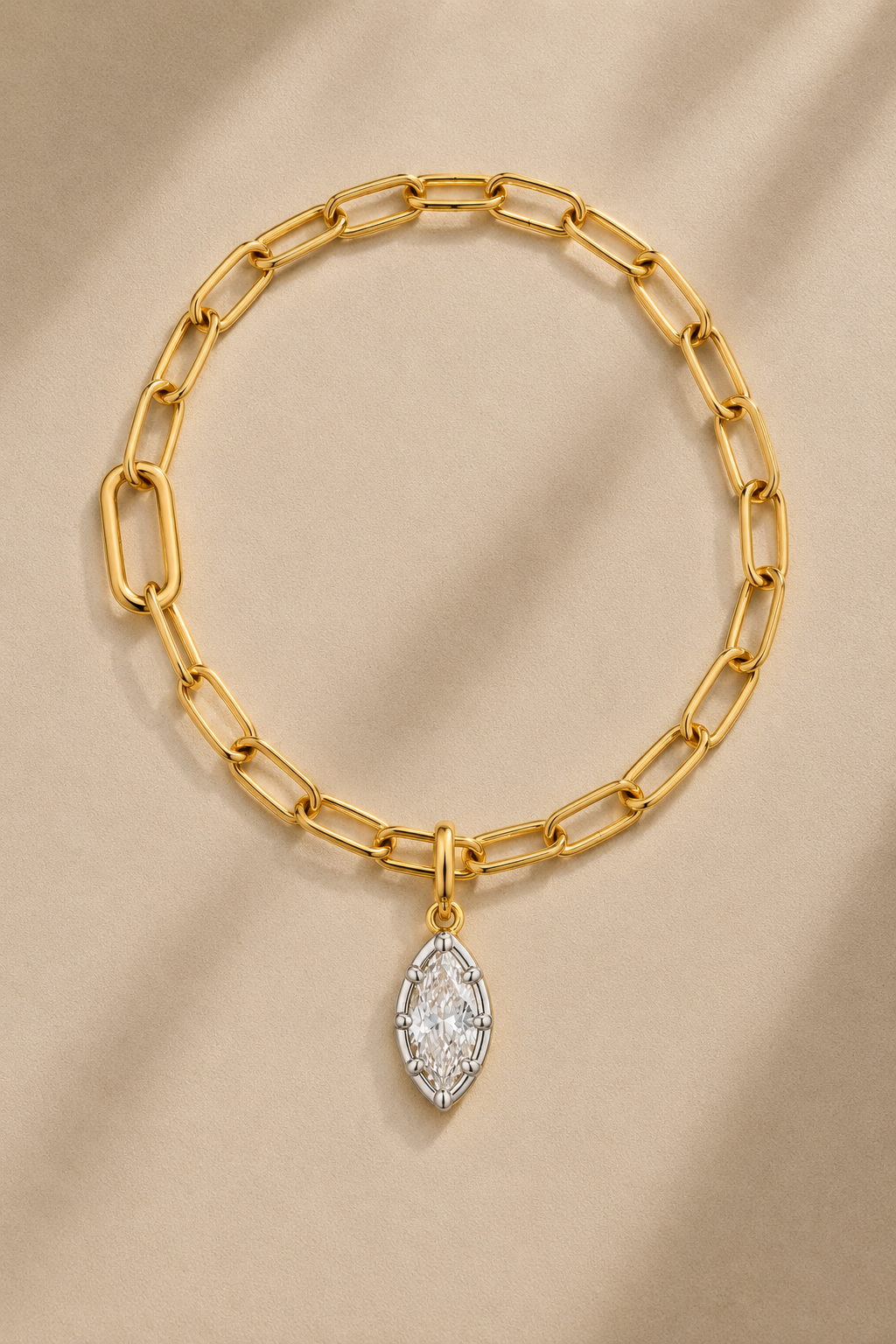 Gold paperclip bracelet with Vittoria silver and gold marquise crystal charm