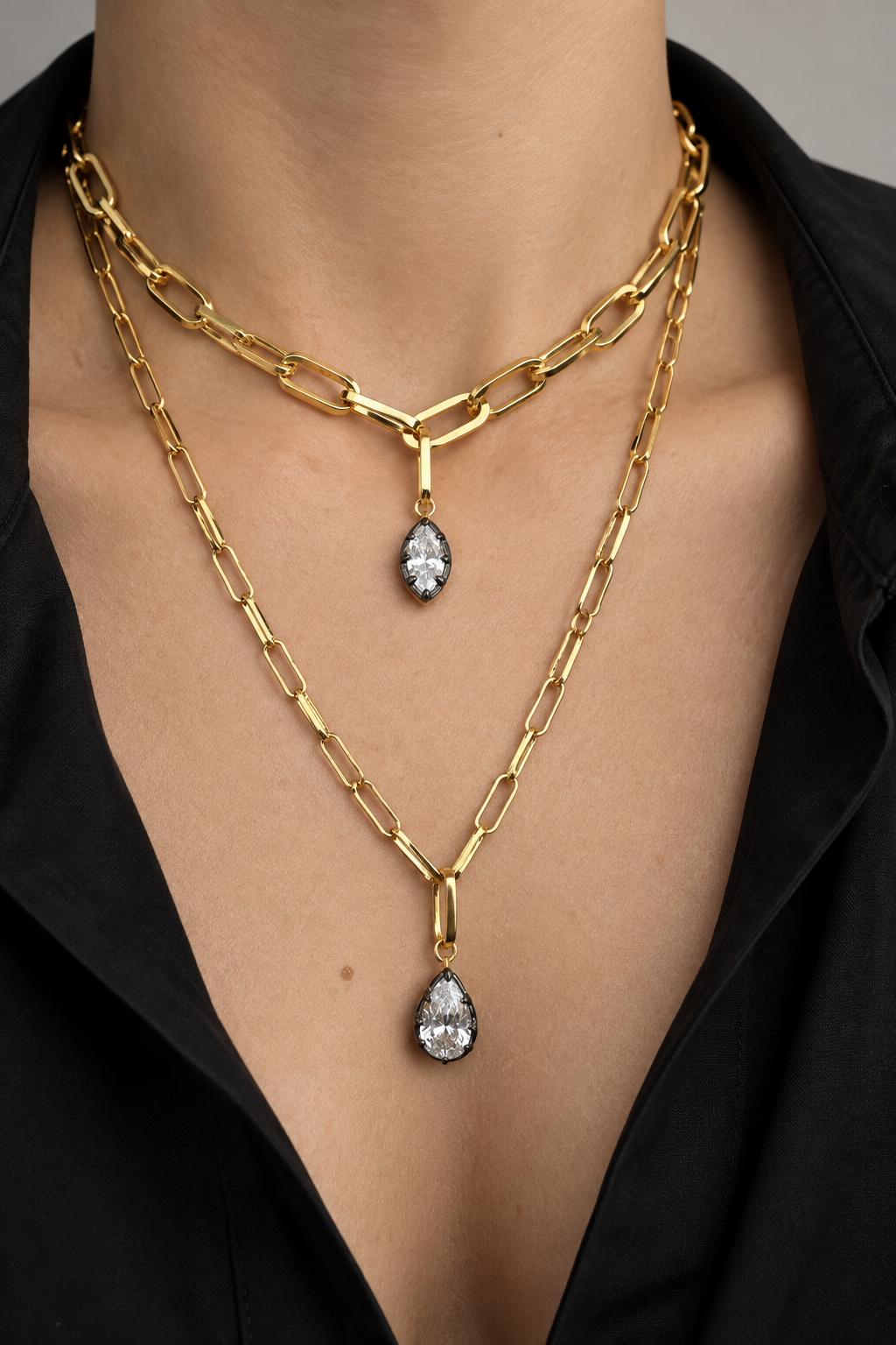 Layered gold necklace look by Galleria Armadoro featuring the 35 cm Cara Necklace and 50 cm Large Link Necklace with black rhodium Vittoria marquise and pear charms.