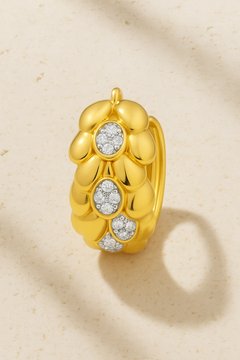 Leona Gold Huggie Earring in sculptural 18ct gold-plated sterling silver with hand-set pavé CZ stones, designed by Galleria Armadoro.
