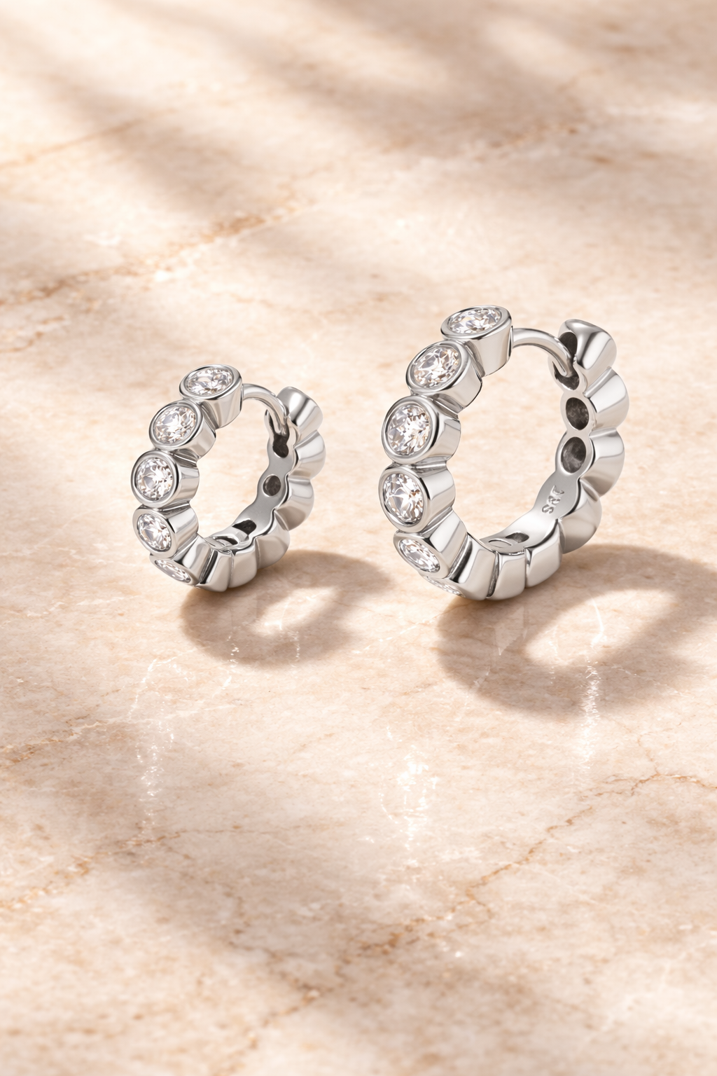 Double ear piercing sterling silver huggie set with 8mm and 11mm Lola bezel set white CZ hoops