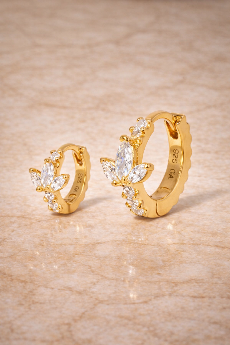 Double ear piercing gold vermeil huggie set with 6.5mm and 8.5mm lotus hoops with white CZ stones