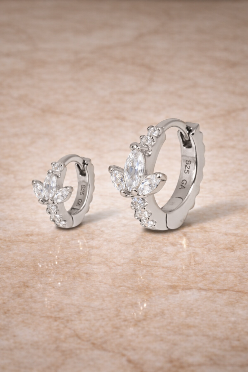 Double ear piercing sterling silver huggie set with 6.5mm and 8.5mm lotus design and white CZ stones