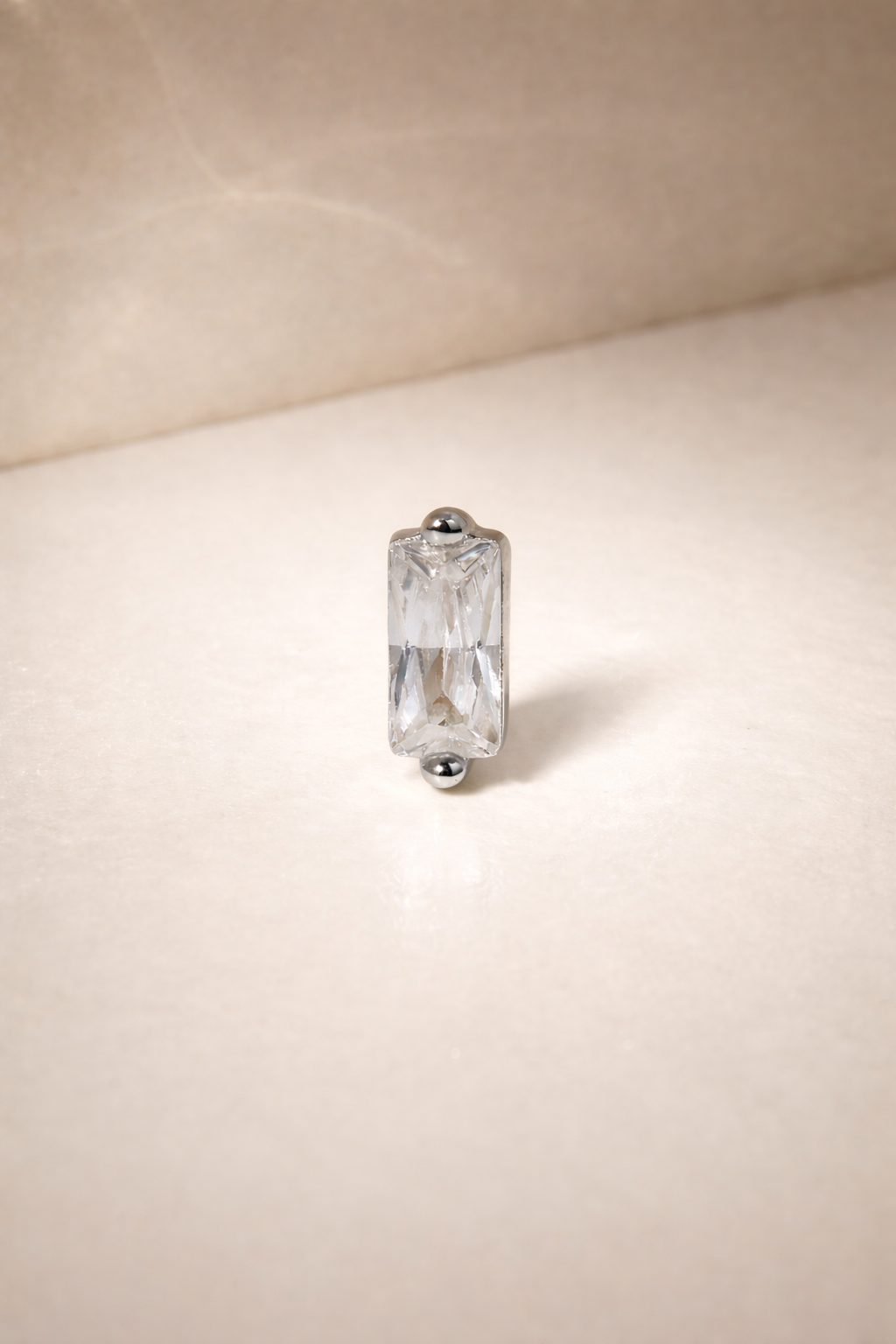 Mini baguette sterling silver stud earring