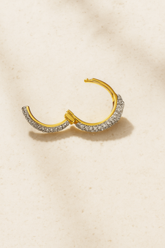 Open view of Ophelia pavé huggie showing hinge mechanism and micro-pavé stones.
