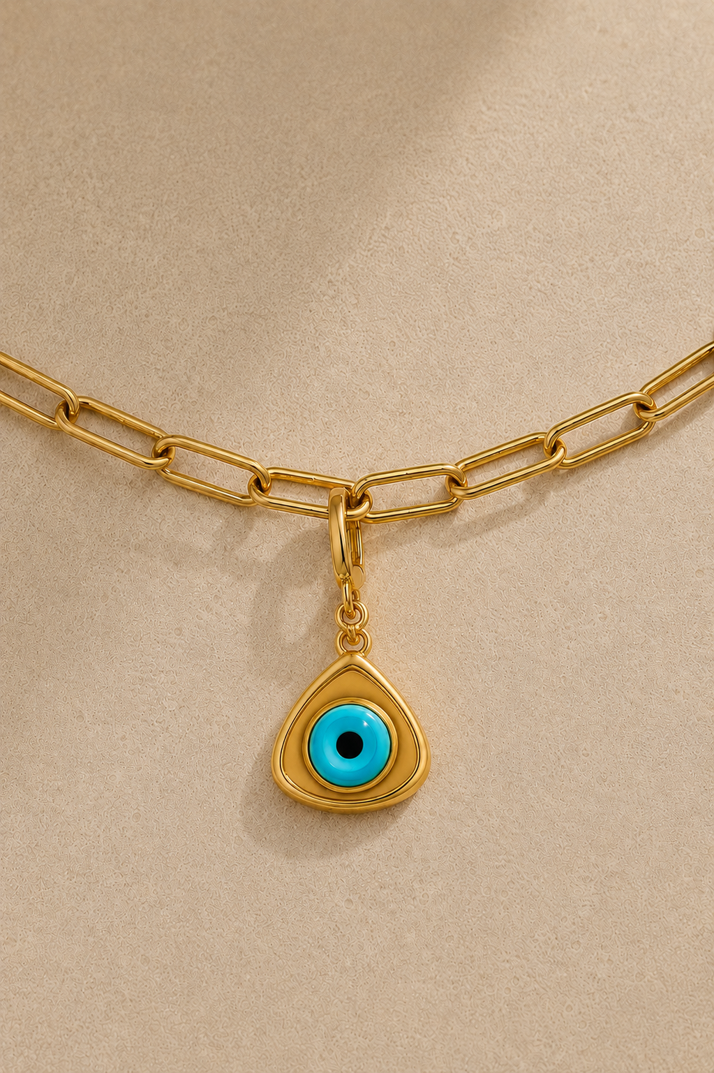 Gold paperclip anklet with triangle evil eye charm and turquoise detailing