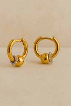Pair of Kora gold bead huggie earrings with halo-set crystals