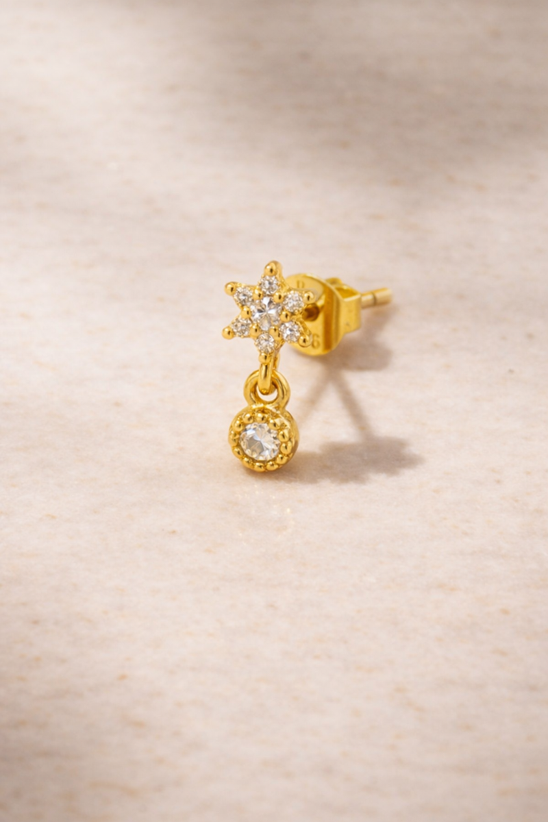 24ct gold plated Romy stud earring side view showing butterfly post, star CZ cluster and dangling CZ drop