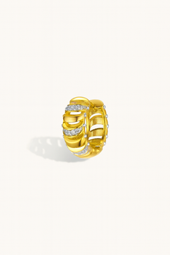 Side view of Noor Gold Huggie Earring showing 18ct gold plating and pavé CZ stones — hypoallergenic sterling silver huggie earring.
