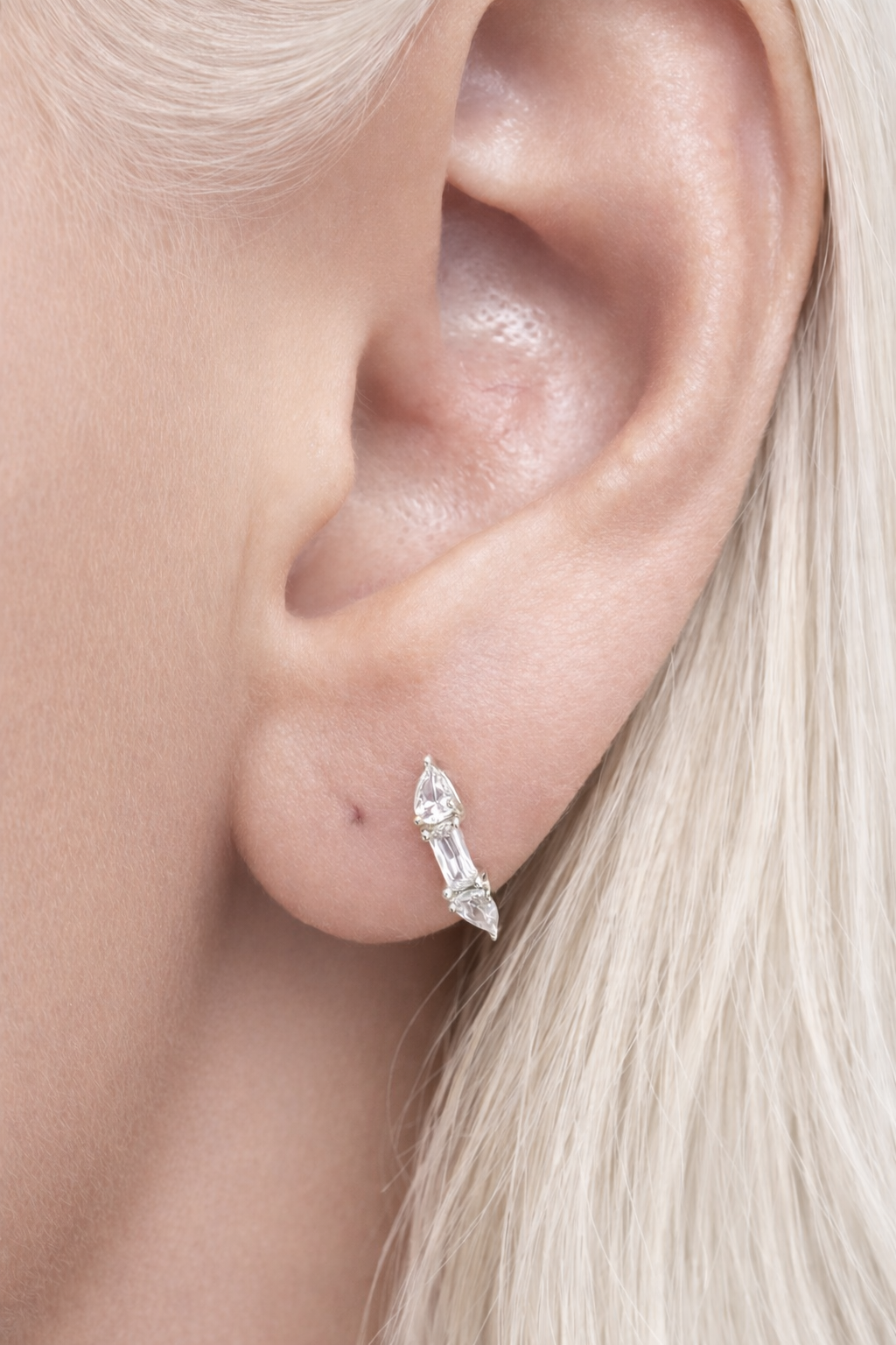 “Silver mini hoop worn on ear, Ivy 6.5 mm”