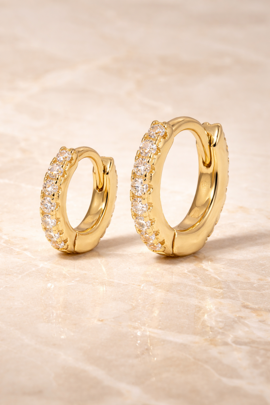 Double ear piercing gold vermeil pavé huggie set with 6.5mm and 8.5mm hoops and white CZ stones