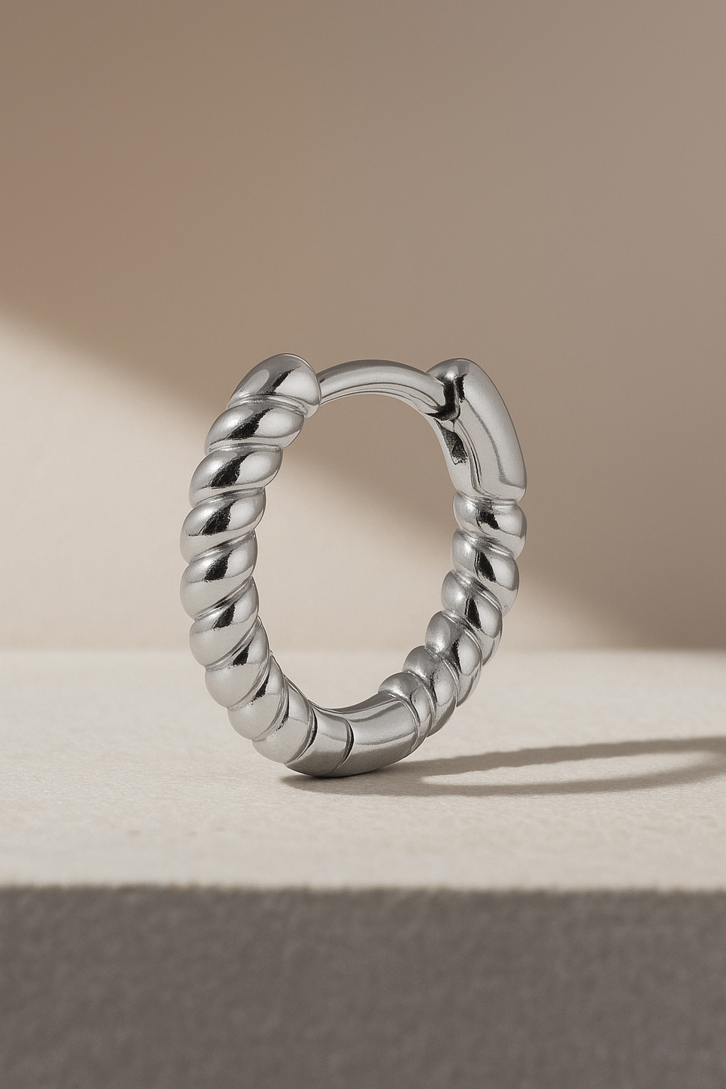Speira 11mm sterling silver huggie