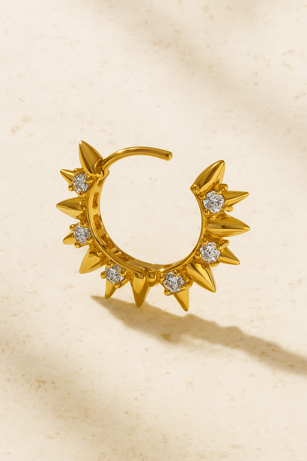 Spinetta Gold Huggie Earring — 18ct gold-plated sterling silver hoop featuring thorn-like details and hand-set pavé stones.
