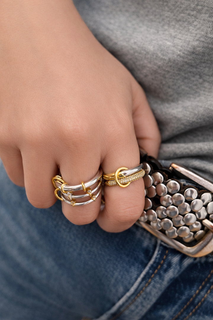 Mixed-metal ring stack by Galleria Armadoro featuring the Nora and Clara Rings in polished silver and gold with pavé detailing.
