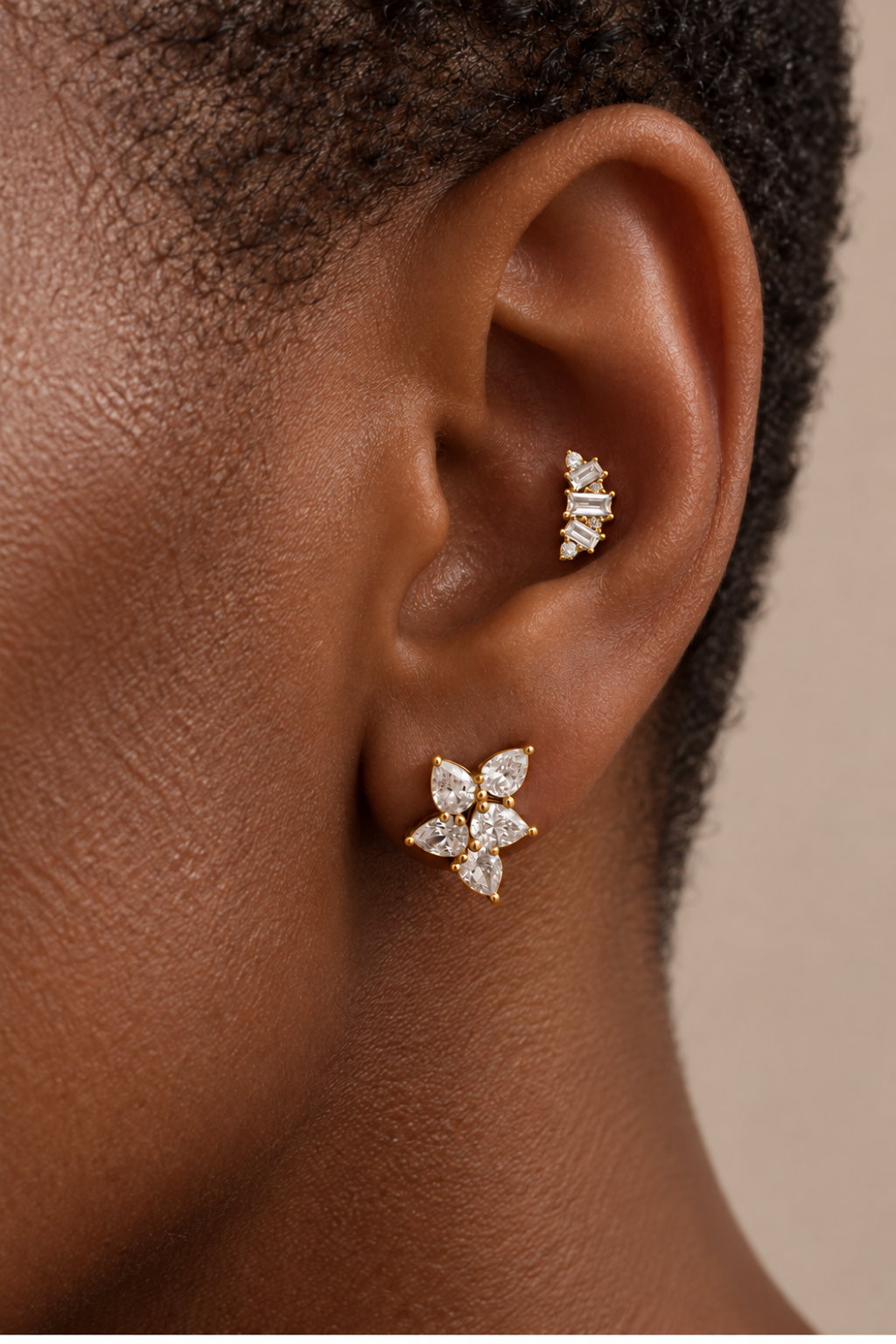 Silver ear stack by Galleria Armadoro featuring the Odette Stud at the lobe and the Lumière Stud styled higher on the ear.