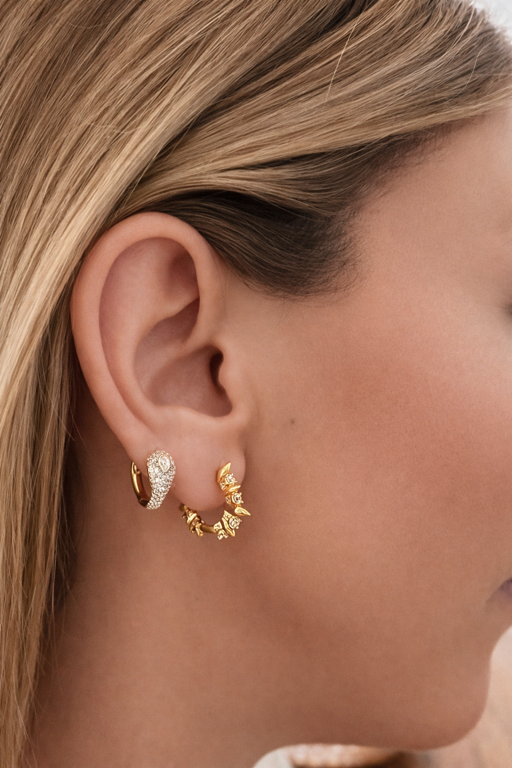 Gold ear stack by Galleria Armadoro featuring Opheleia and Spinetta earrings styled together in a sculptural two-piece ear look.