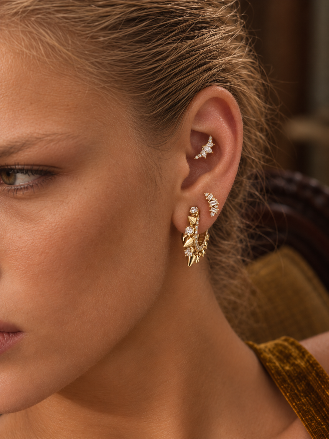 Sculptural gold ear stack by Galleria Armadoro featuring Spina with pointed gold, pavé and crystal piercing jewellery.