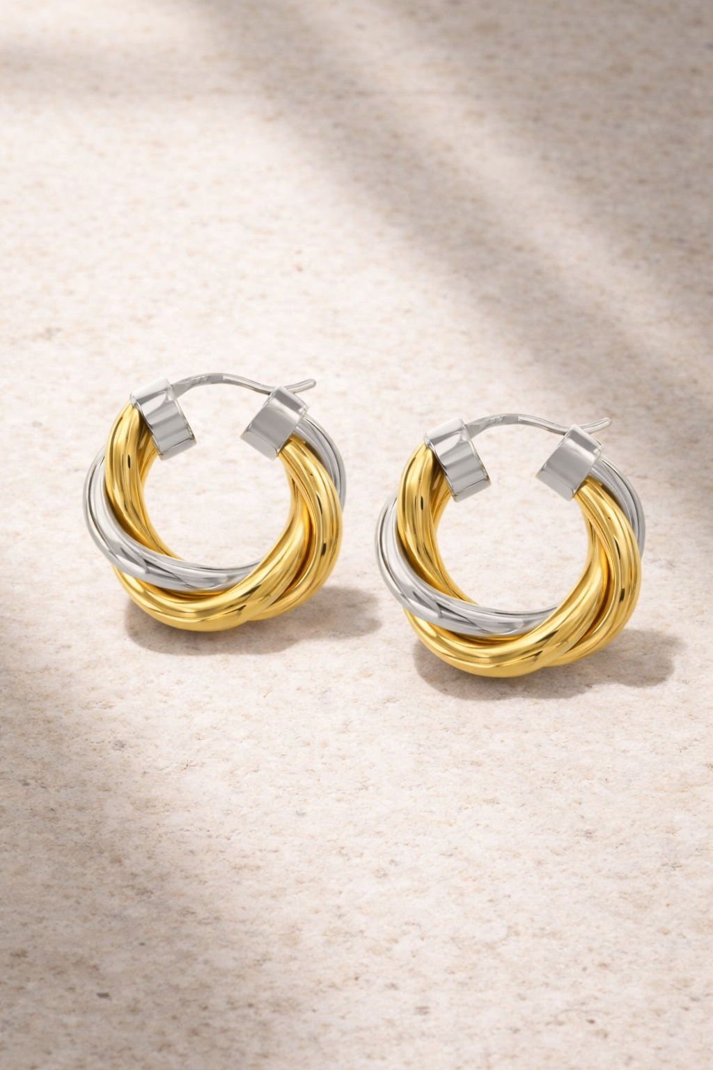 close up gold and silver twisted hoop earrings 2cm lightweight mixed metal hoops