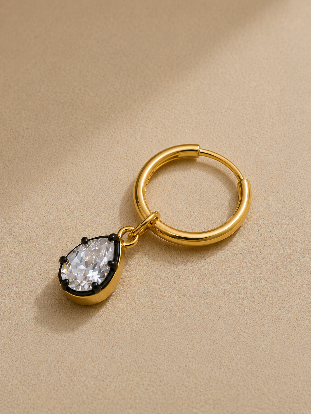 12.5mm gold huggie earring with Vittoria black rhodium teardrop crystal charm