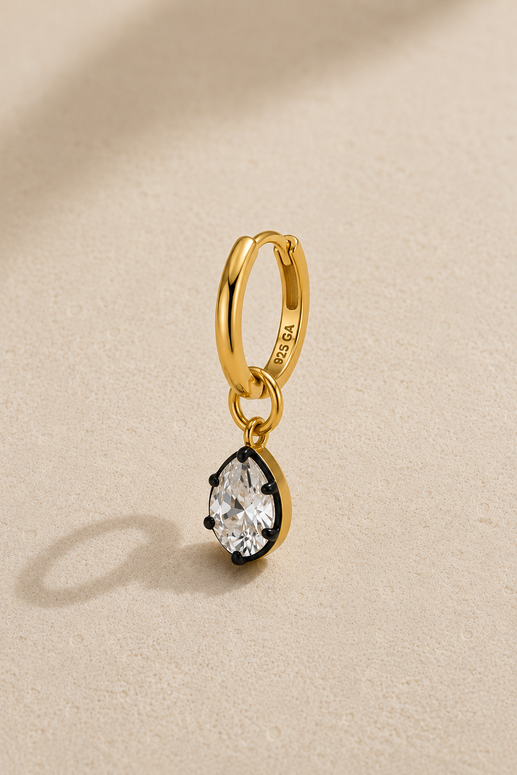 11mm gold huggie earring with Vittoria black rhodium and gold teardrop crystal charm