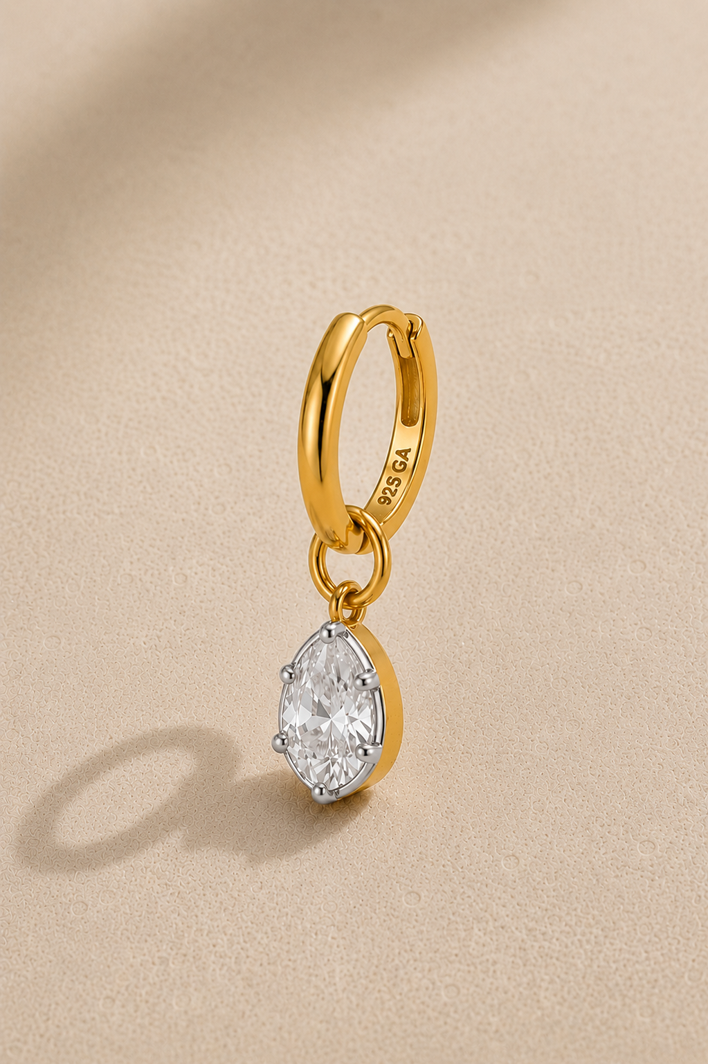 8.5mm gold huggie earring with Vittoria silver and gold teardrop crystal charm