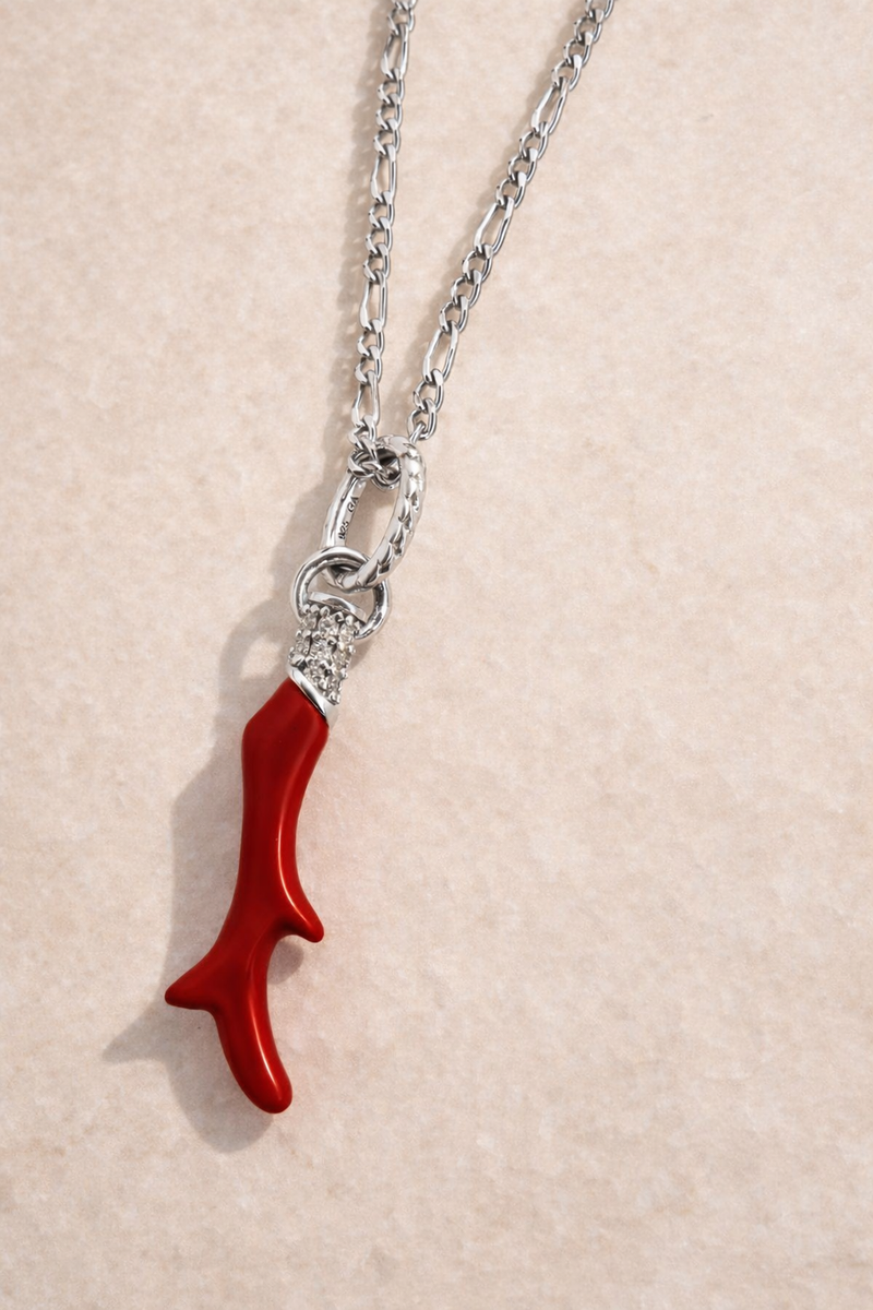 Vault exclusive Speira red coral charm necklace in 925 sterling silver on dainty Scarlett chain, studio photo on beige marble surface