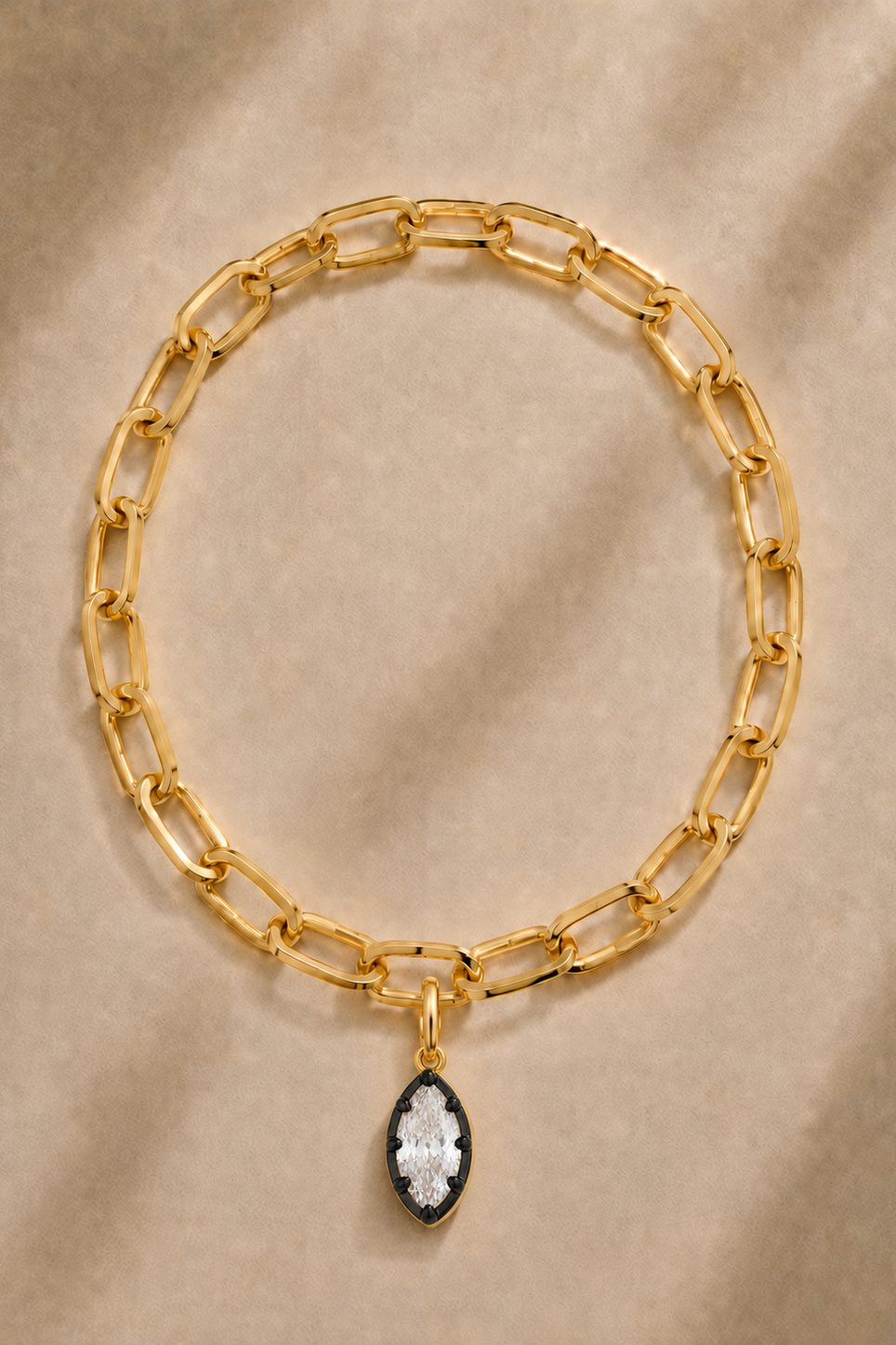 Cara chunky gold bracelet with Vittoria black and gold marquise crystal charm
